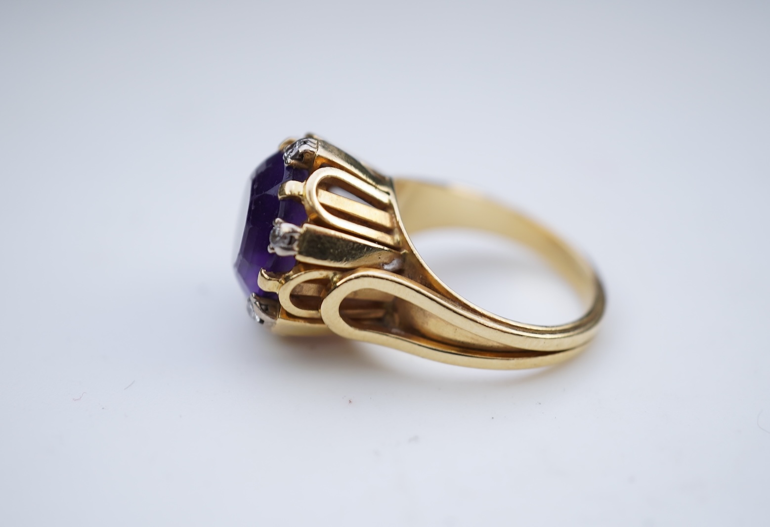 A stylish amethyst and diamond ring